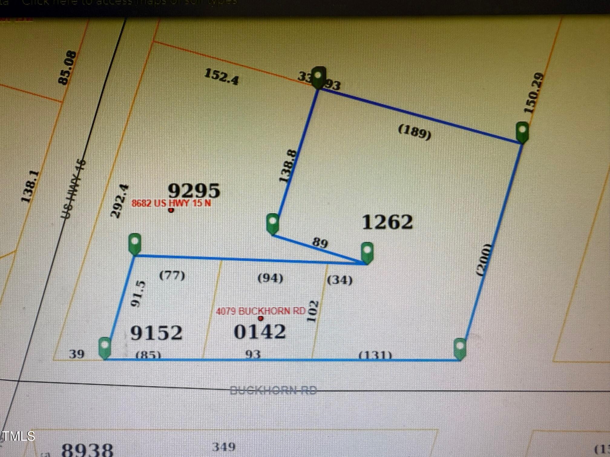 4079 Buckhorn Road Bullock, NC 27507 - Photo 10 of 11 a close view of a refrigerator in a kitchen