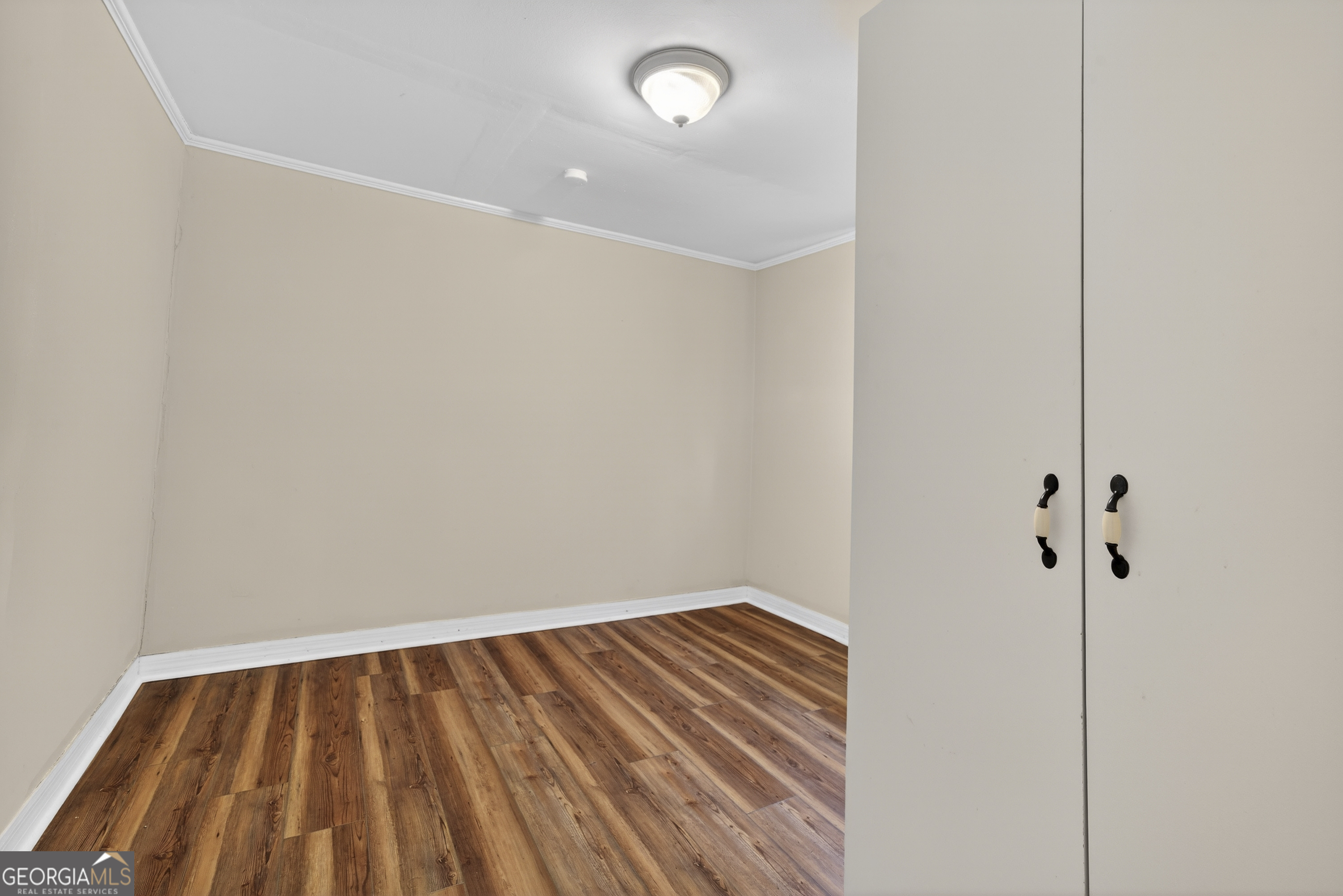 126 Elizabeth Circle Jackson, GA 30233 - Photo 20 of 41 a view of room with wooden floor