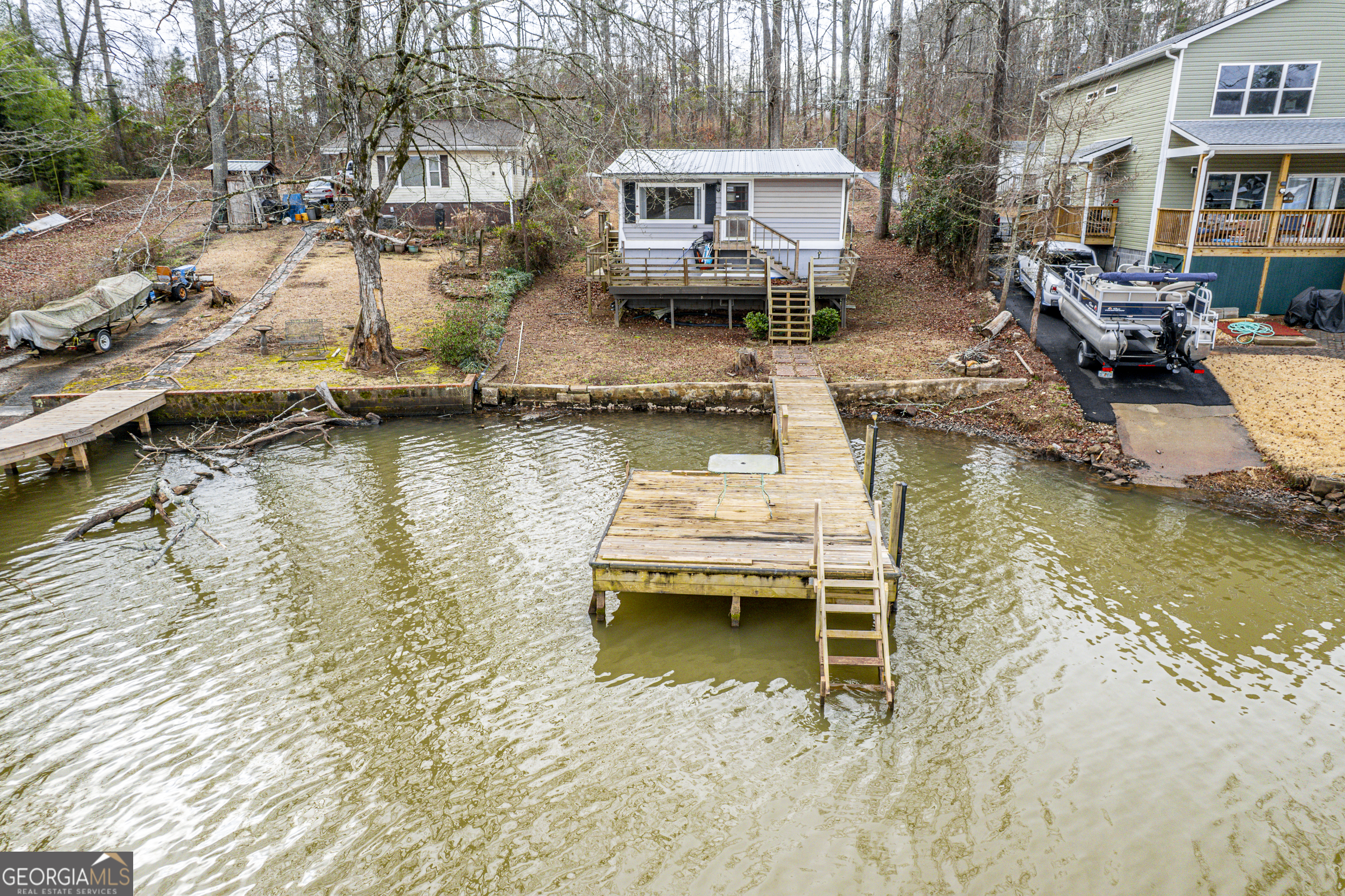 126 Elizabeth Circle Jackson, GA 30233 - Photo 2 of 41 a view of a lake with boats and trees
