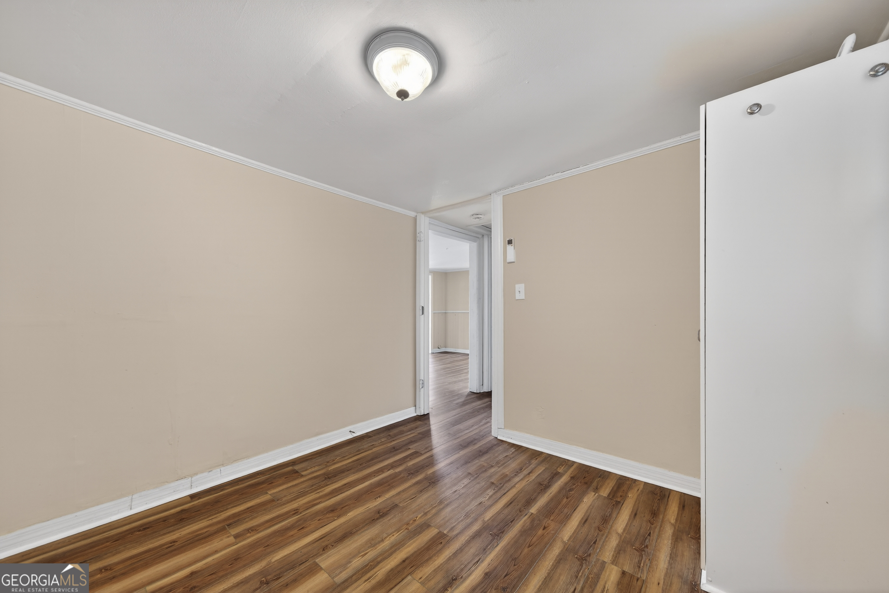 126 Elizabeth Circle Jackson, GA 30233 - Photo 25 of 41 a view of room with wooden floor