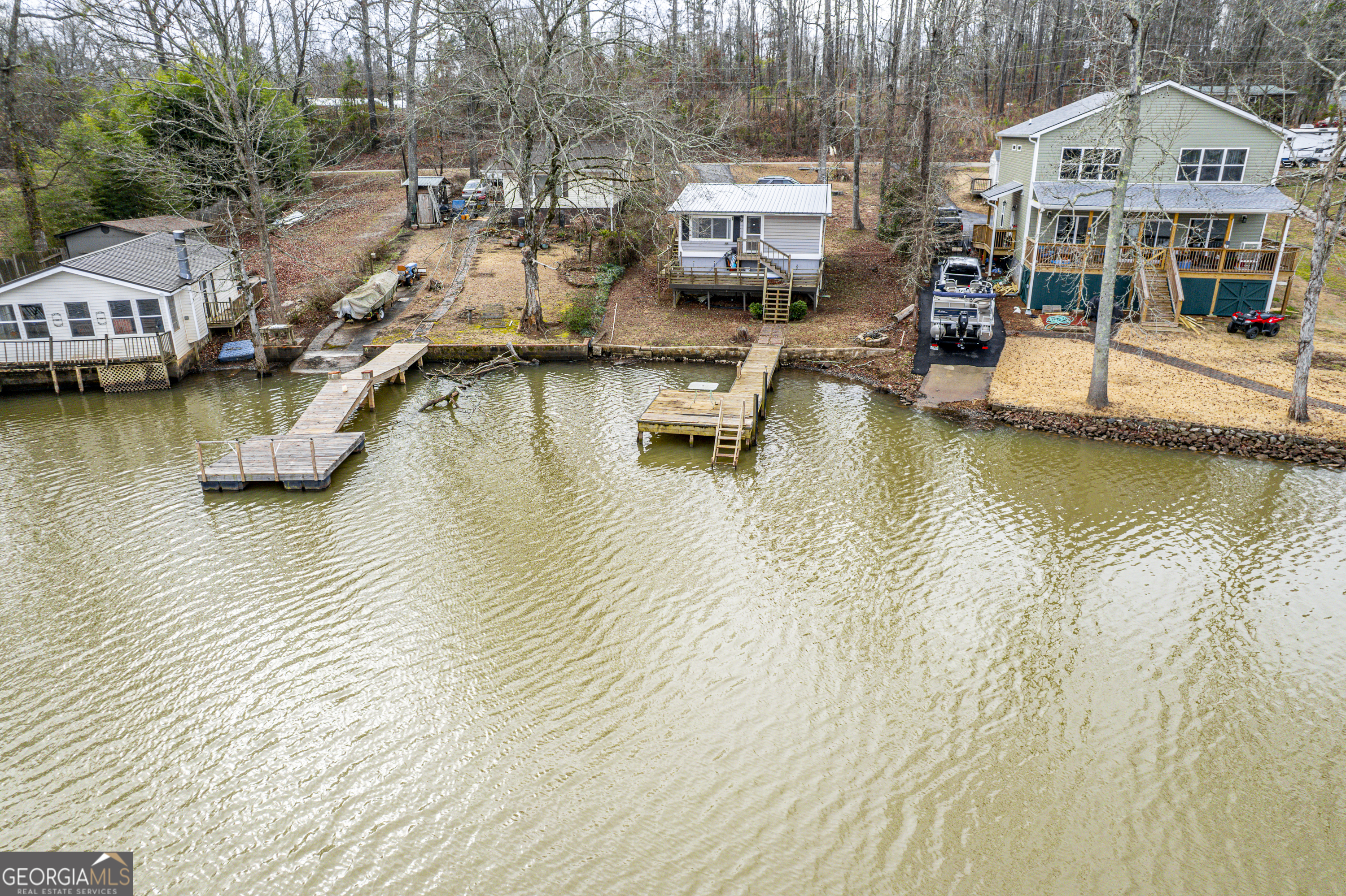 126 Elizabeth Circle Jackson, GA 30233 - Photo 37 of 41 a view of a lake with houses