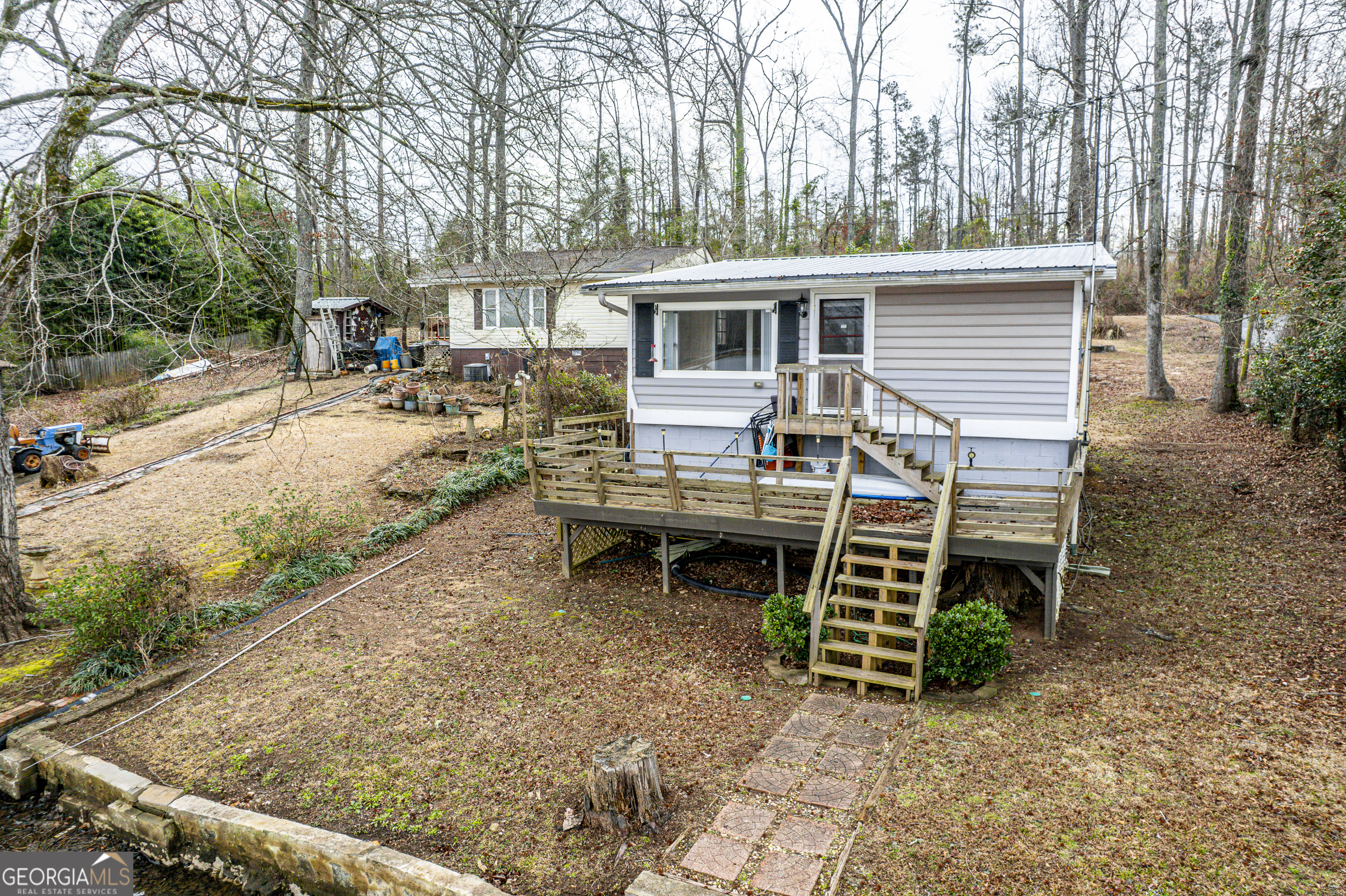 126 Elizabeth Circle Jackson, GA 30233 - Photo 38 of 41 a view of a house with a yard and sitting area