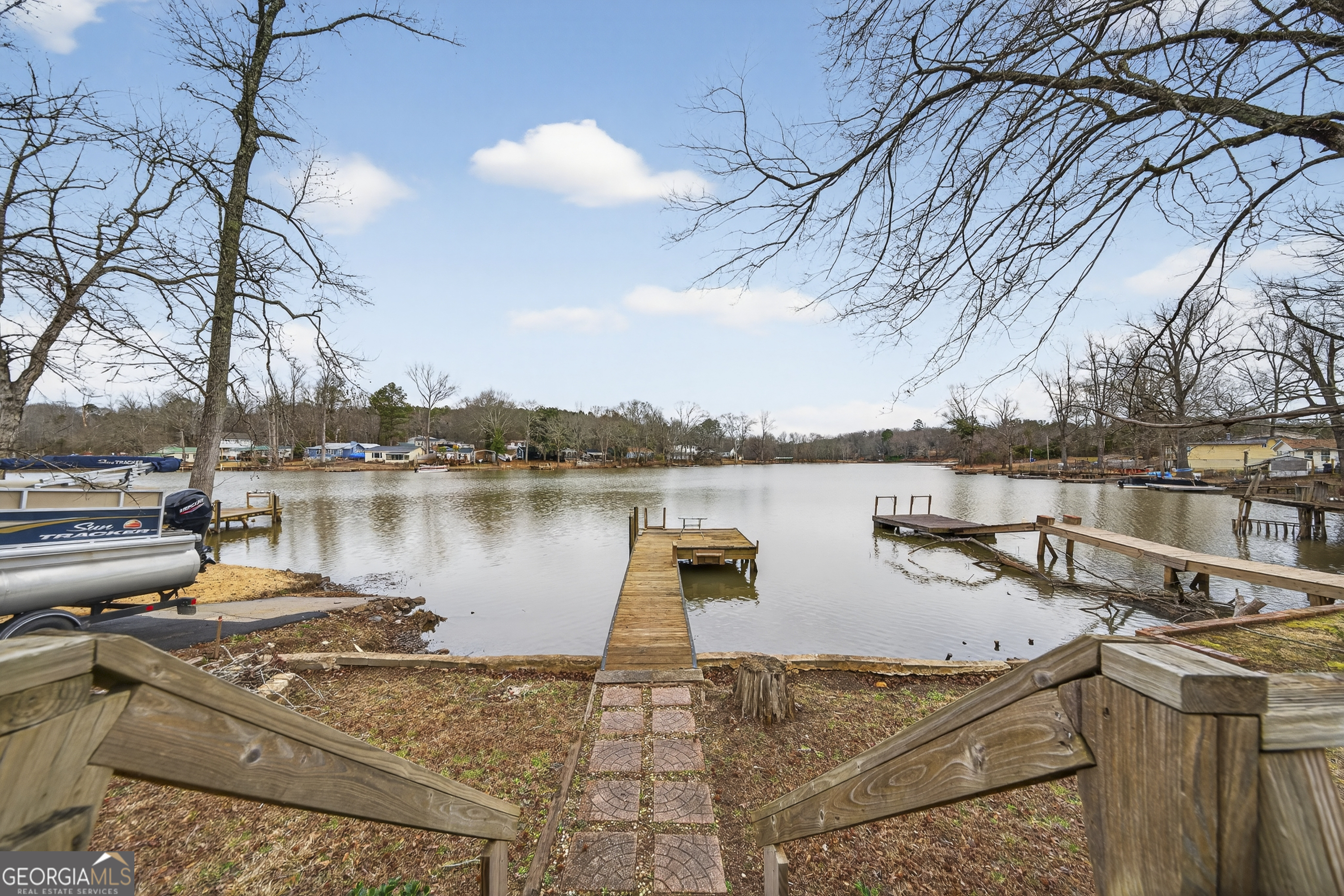126 Elizabeth Circle Jackson, GA 30233 - Photo 40 of 41 a view of a lake with houses