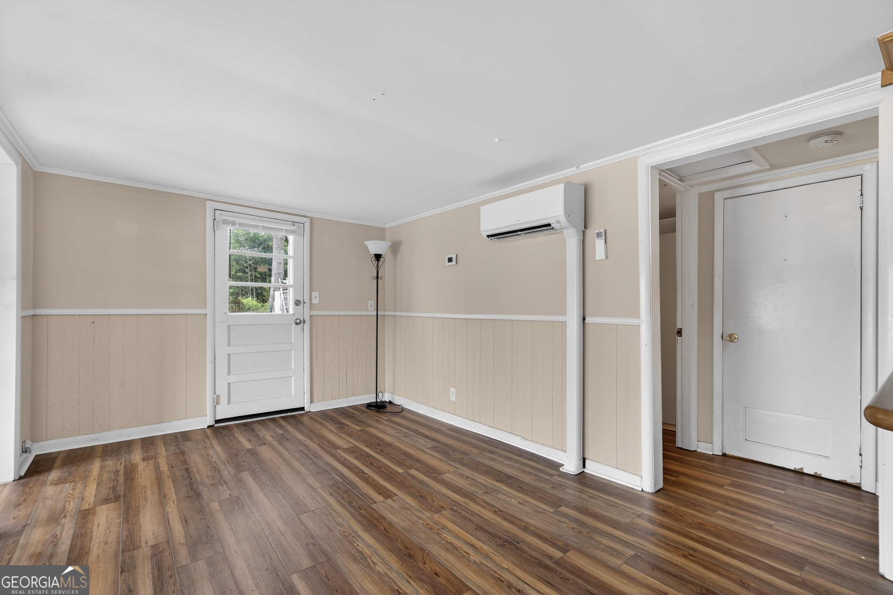 126 Elizabeth Circle Jackson, GA 30233 - Photo 10 of 41 an empty room with wooden floor and closet area