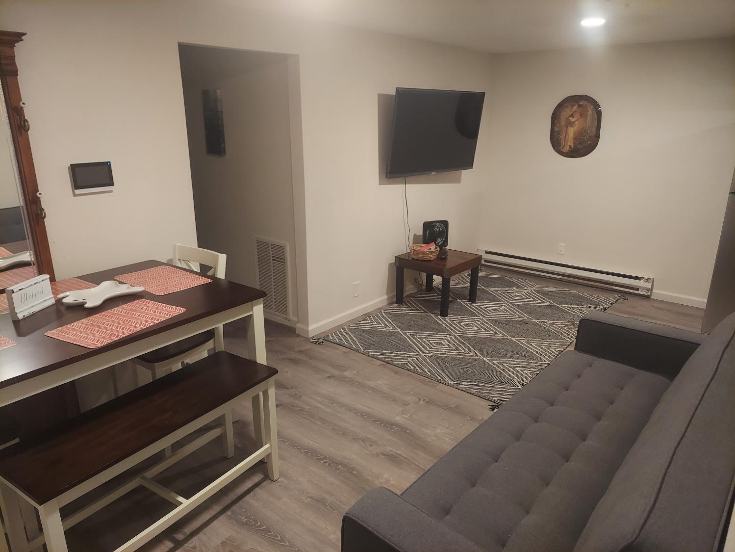 489 Alpine Drive Colfax, CA 95713 - Photo 27 of 46 a bedroom with a bed and a flat screen tv