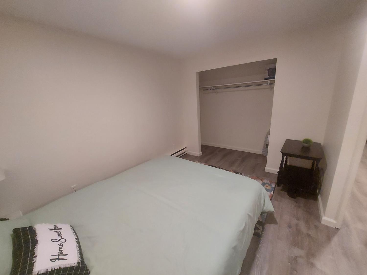 489 Alpine Drive Colfax, CA 95713 - Photo 35 of 46 a bedroom with a bed and a closet