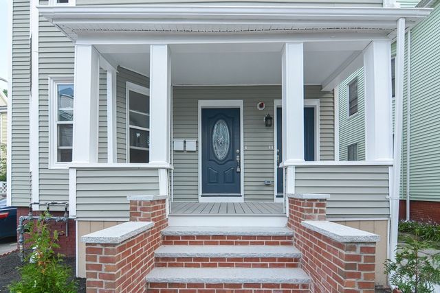a front view of a house with a balcony