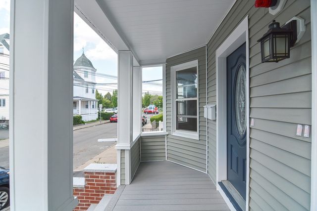 a view of a porch with a bench