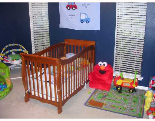 3012 Todd Circle Ingleside, TX 78362 - Photo 6 of 10 a bedroom with a bed and a window