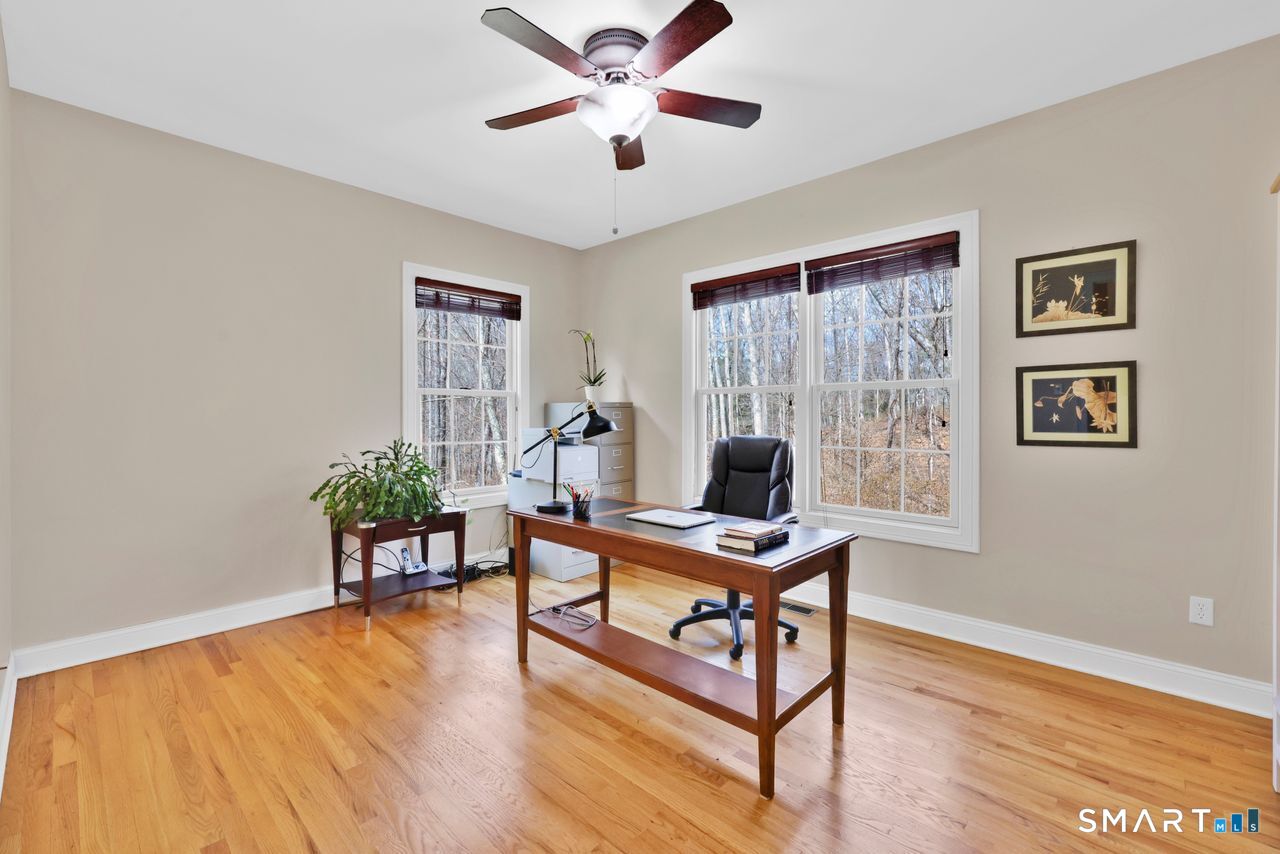 1 Bramble Trail Newtown, CT 06470 - Photo 13 of 31 a workspace with wooden floor and a window
