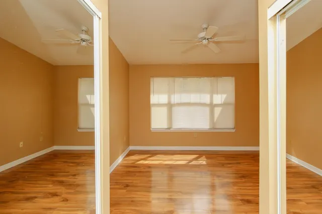 a view of an empty room and window