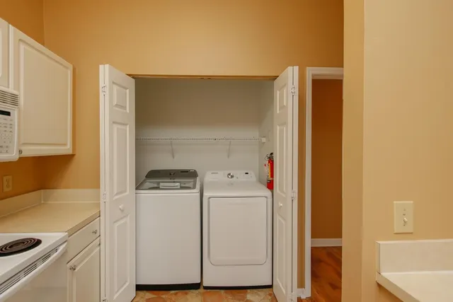 a utility room with dryer and washer