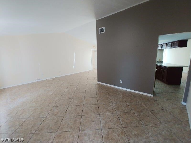 17245 Lee Road Fort Myers, FL 33967 - Photo 3 of 11 a view of an empty room with a window