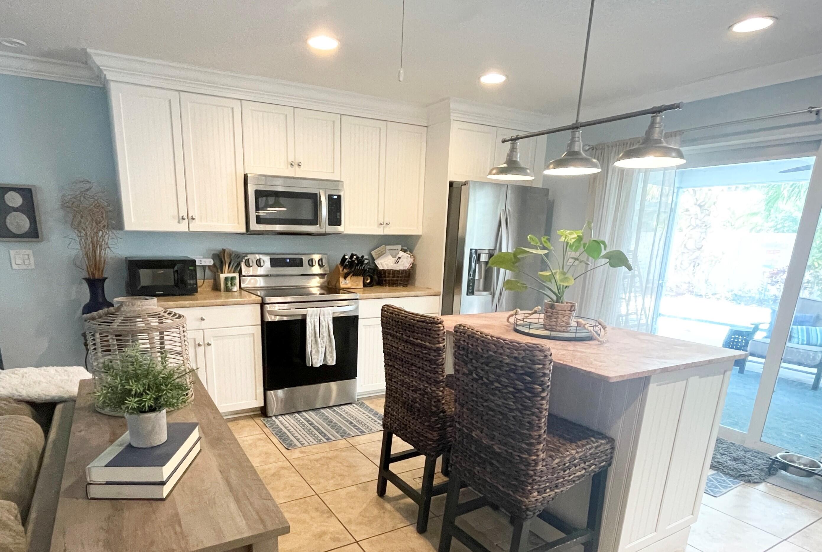 403 West Riverside Drive Tequesta, FL 33469 - Photo 4 of 26 Kitchen 2