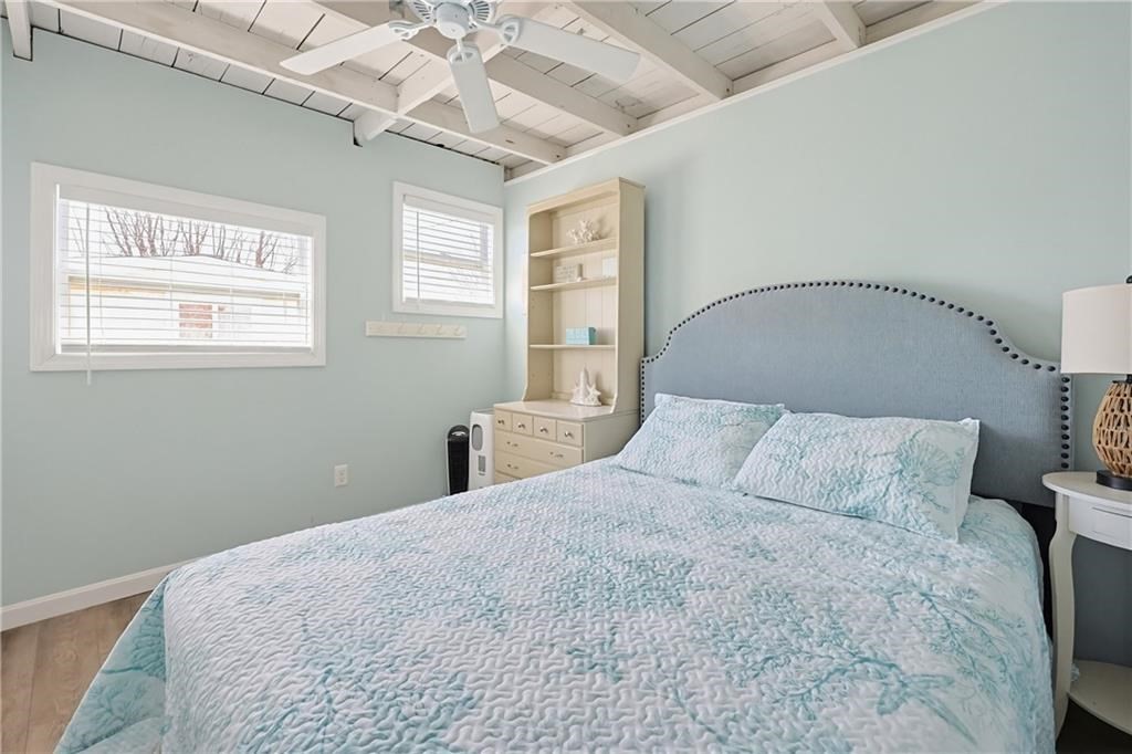 271 Great Island Road, Unit G Narragansett, RI 02882 - Photo 13 of 25 a bedroom with a bed and a window