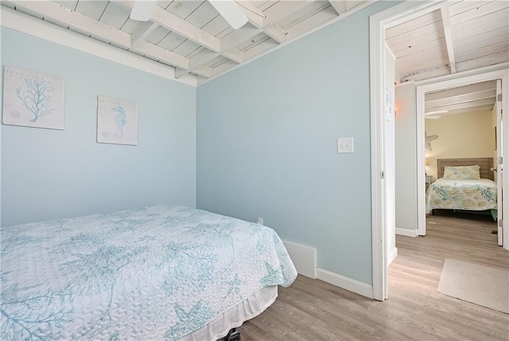271 Great Island Road, Unit G Narragansett, RI 02882 - Photo 15 of 25 a bedroom with a bed and a view of bedroom