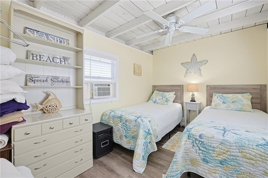 271 Great Island Road, Unit G Narragansett, RI 02882 - Photo 16 of 25 a bedroom with a bed and a dresser