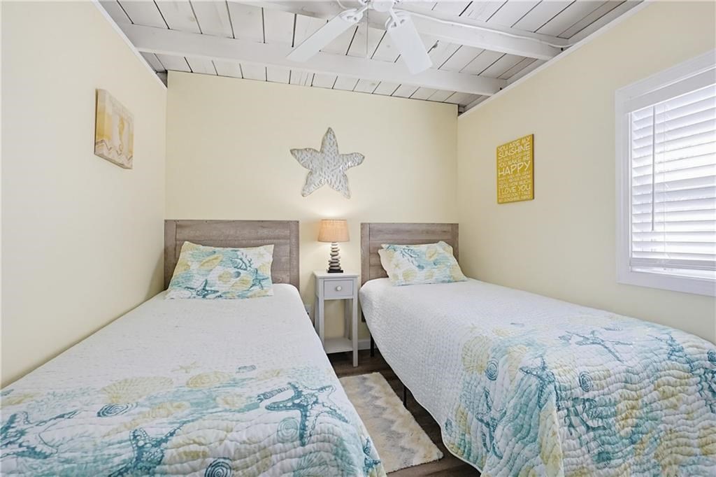 271 Great Island Road, Unit G Narragansett, RI 02882 - Photo 17 of 25 a bedroom with a bed and a window
