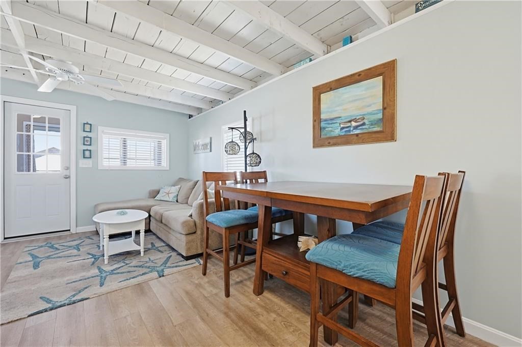 271 Great Island Road, Unit G Narragansett, RI 02882 - Photo 6 of 25 a dining room with furniture and window