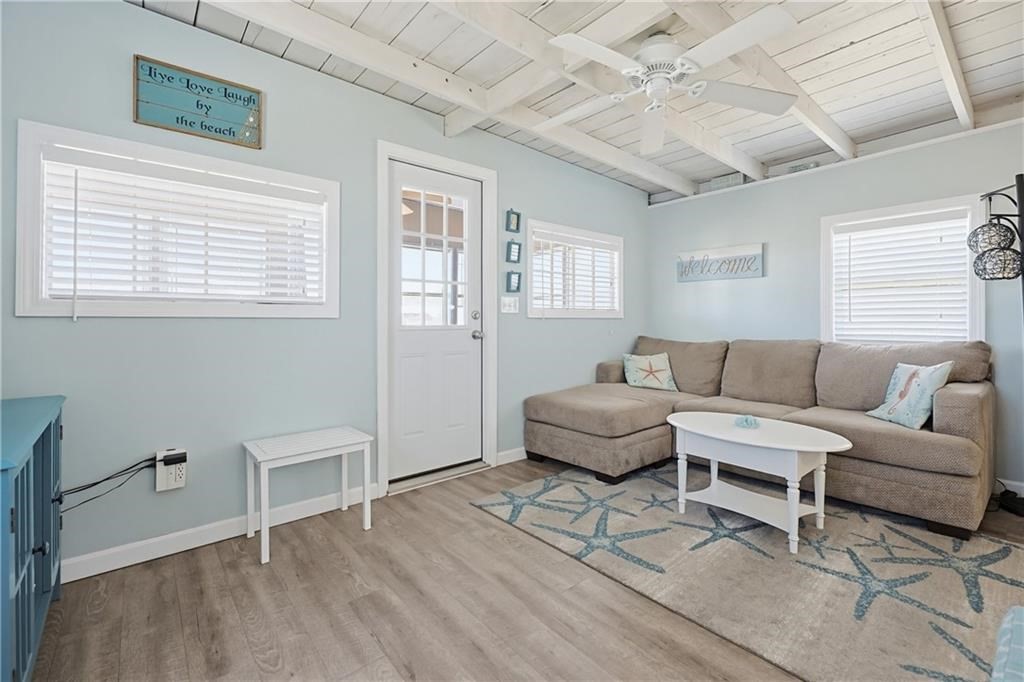 271 Great Island Road, Unit G Narragansett, RI 02882 - Photo 8 of 25 a living room with furniture and wooden floor