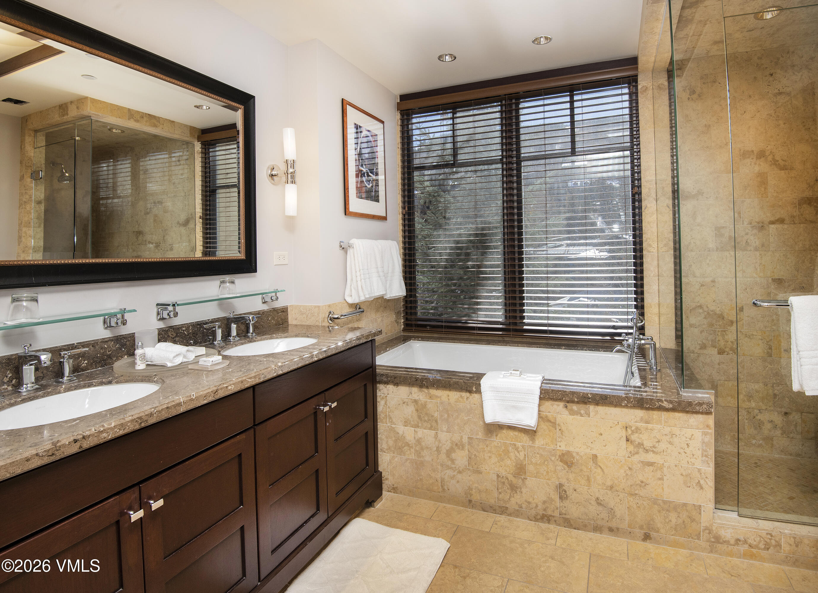 1 Vail Road, Unit 5102C Vail, CO 81657 - Photo 7 of 13 a bathroom with a granite countertop sink mirror and