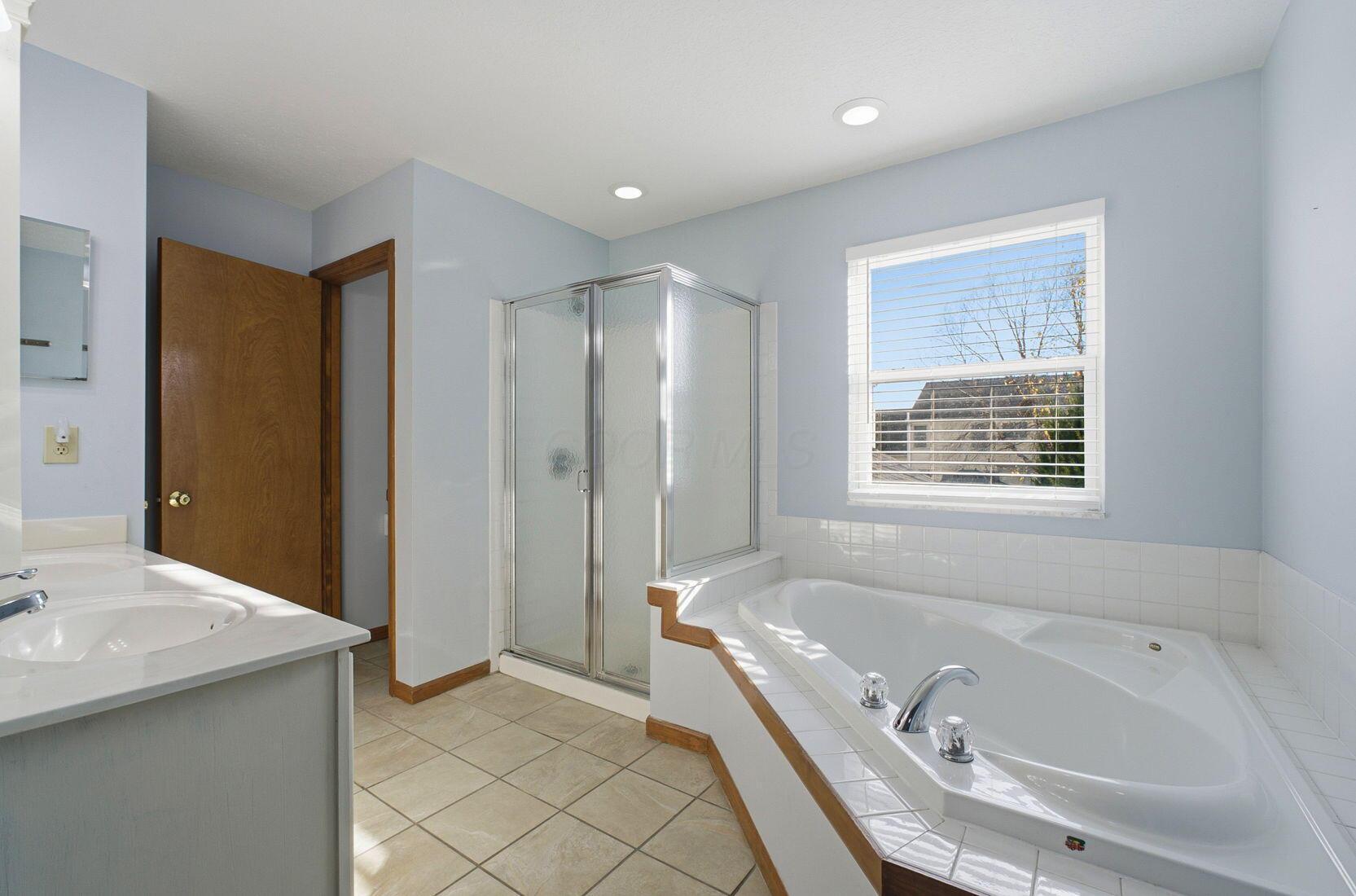 2216 Reeves Avenue Lewis Center, OH 43035 - Photo 32 of 53 Primary en suite
