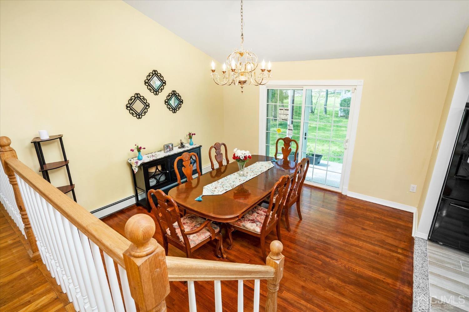 39 Lynnwood Road Edison, NJ 08820 - Photo 14 of 32 a view of a dining room with furniture window and wooden floor