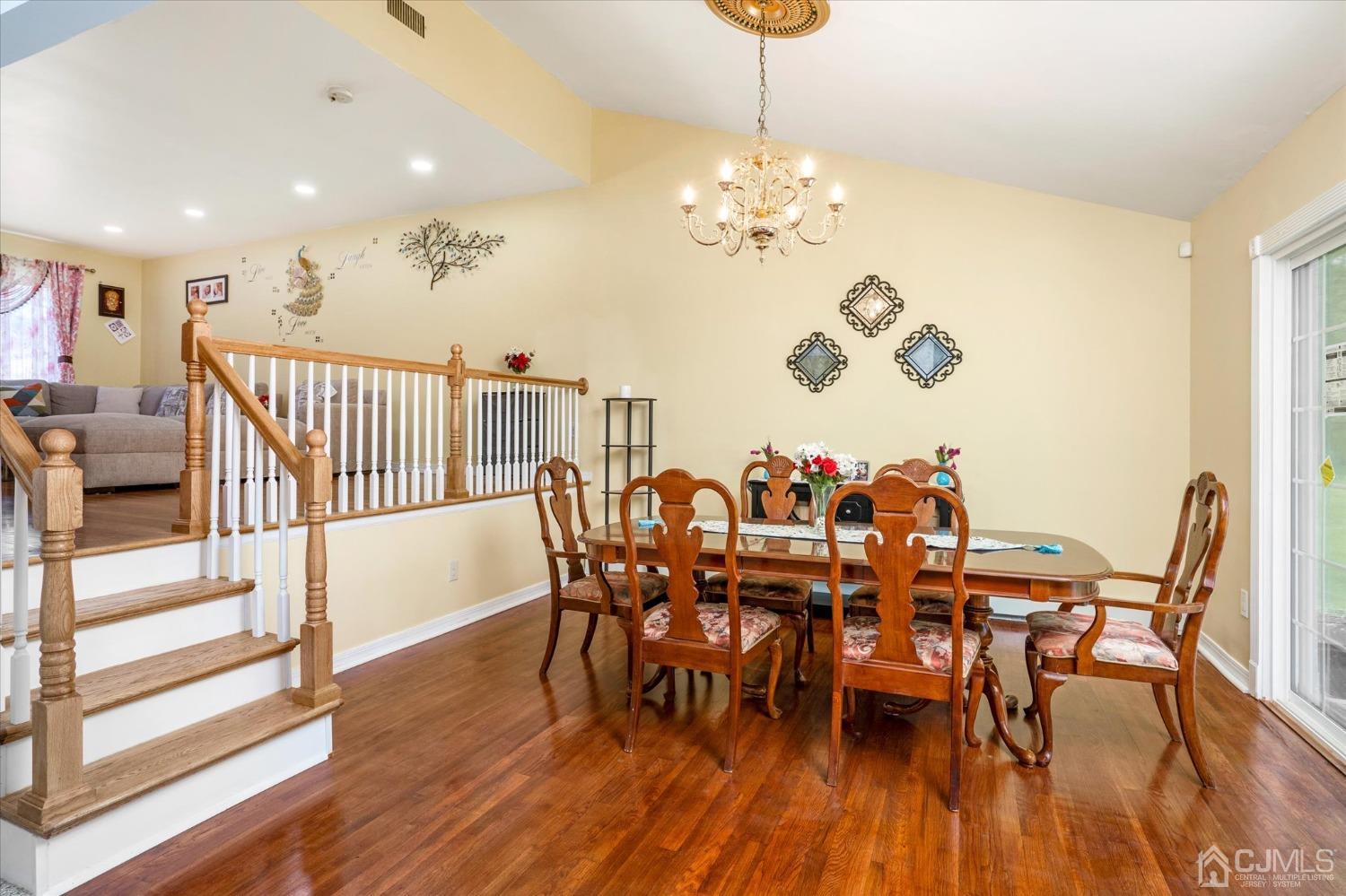 39 Lynnwood Road Edison, NJ 08820 - Photo 15 of 32 a view of a dining room with furniture wooden floor and chandelier