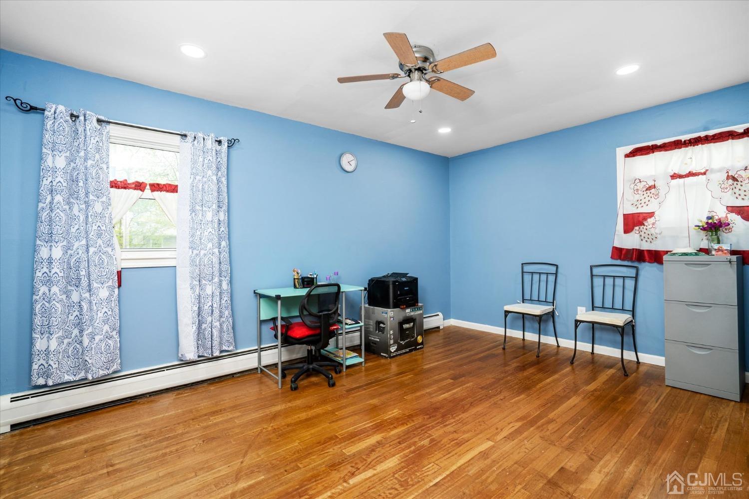 39 Lynnwood Road Edison, NJ 08820 - Photo 21 of 32 a view of a workspace with furniture and a window