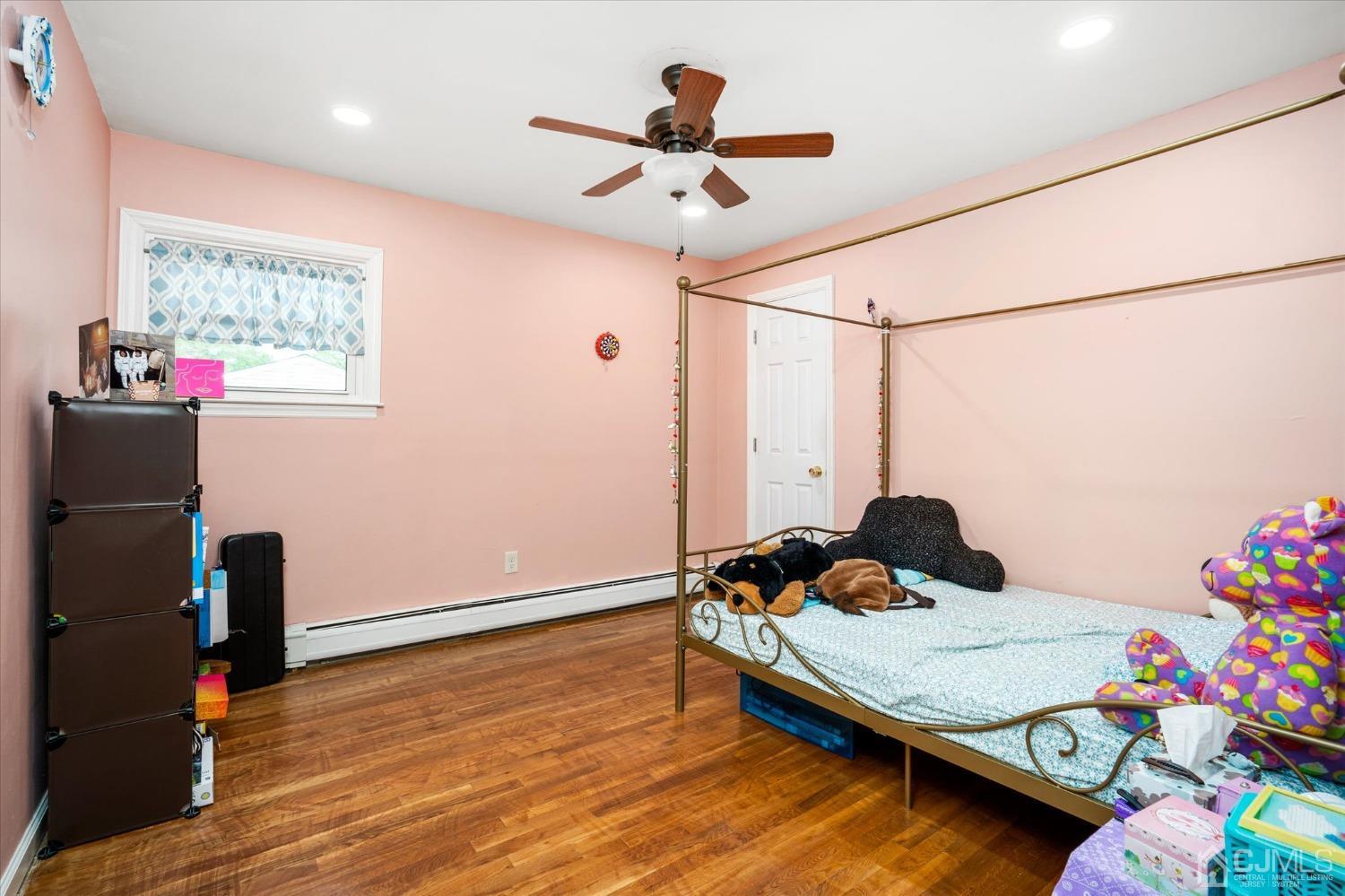 39 Lynnwood Road Edison, NJ 08820 - Photo 23 of 32 a bed room with a bed and a window