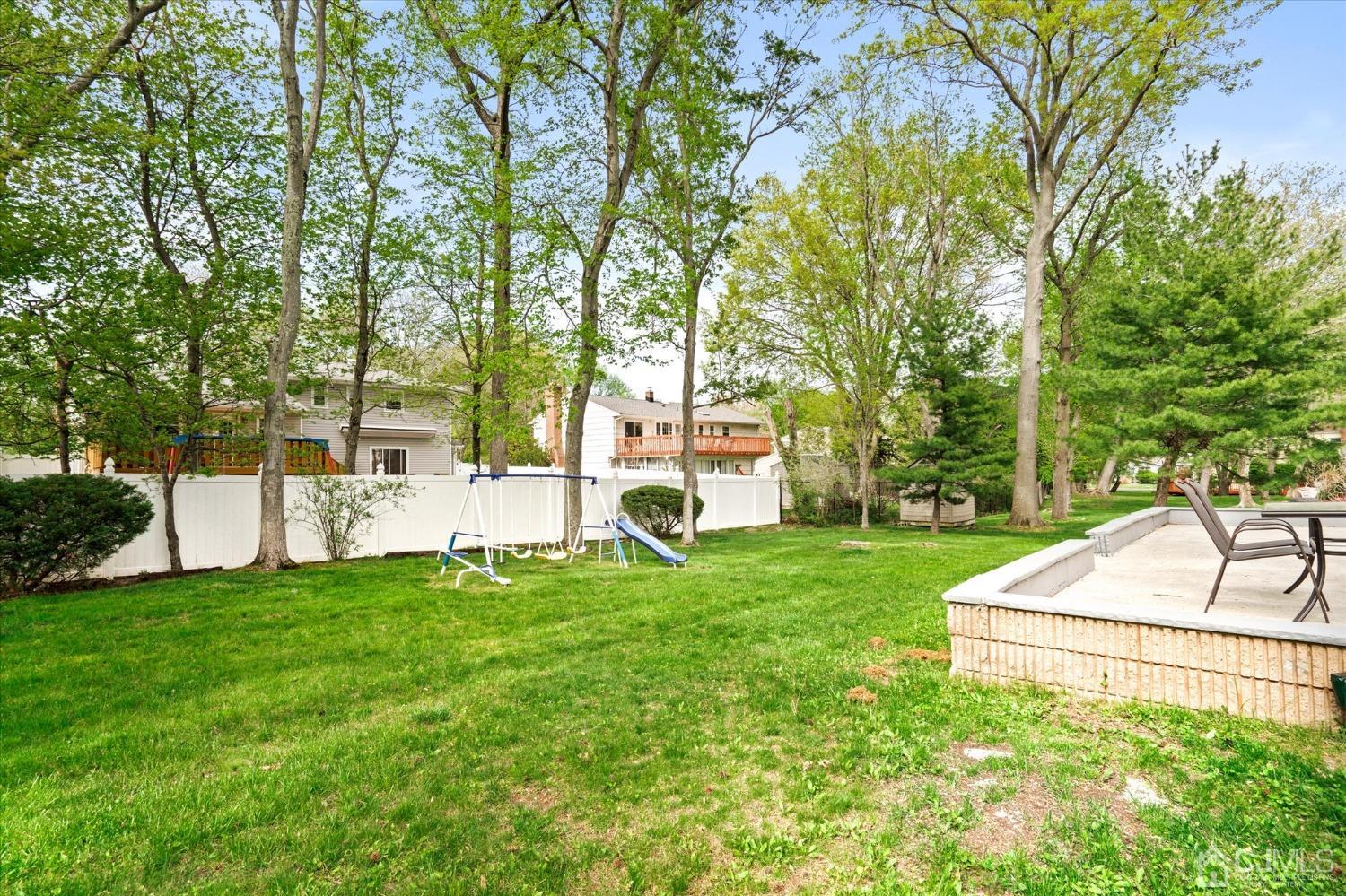 39 Lynnwood Road Edison, NJ 08820 - Photo 31 of 32 a view of a house with backyard