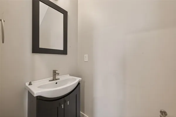 a bed room with bed and a window