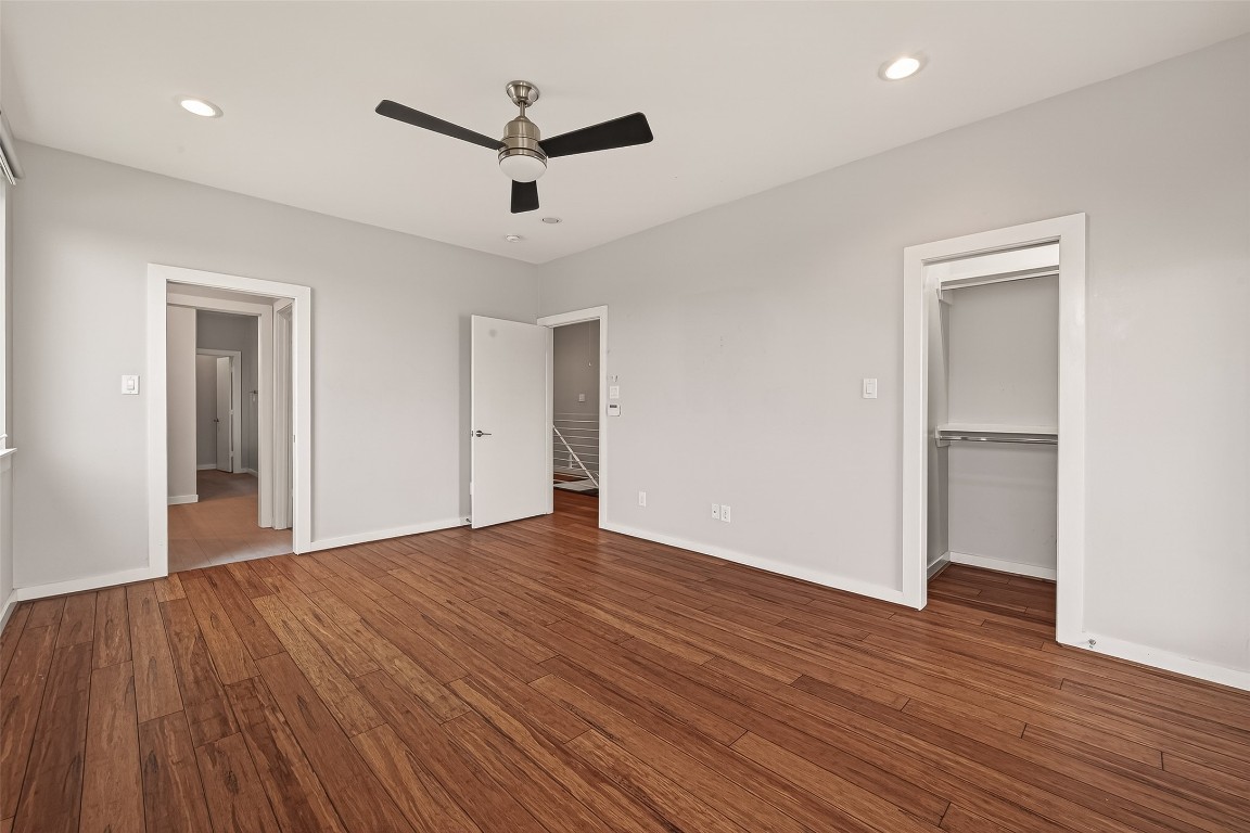 1819 South Street Houston, TX 77009 - Photo 16 of 27 a view of empty room with wooden floor and ceiling fan