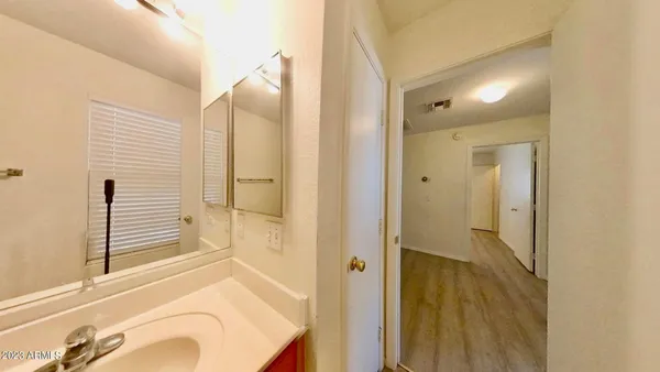 a bathroom with a bathtub and shower