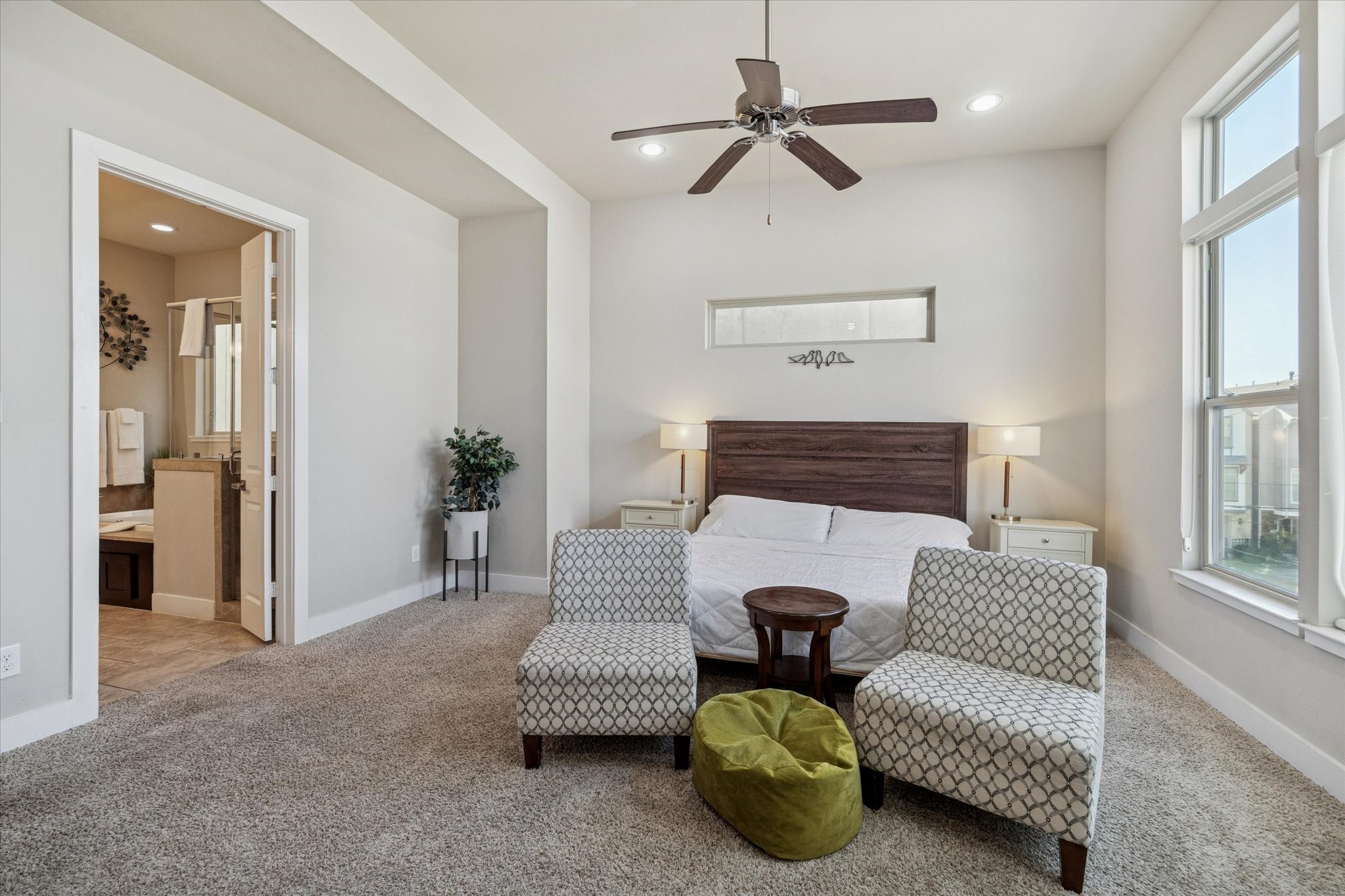 4417 Eli Street Houston, TX 77007 - Photo 11 of 24 Spacious primary bedroom has an ensuite bathroom for enhanced convenience and privacy.