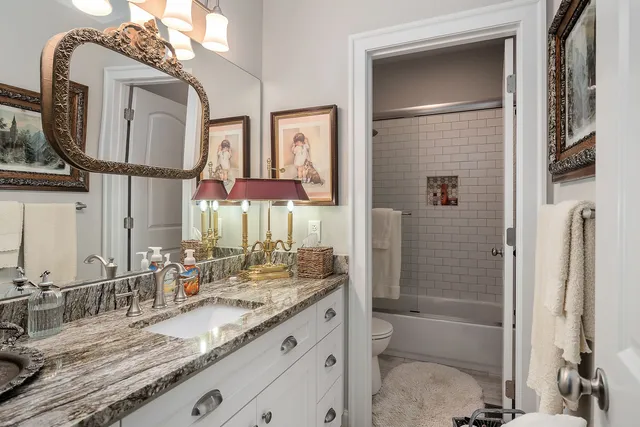 a kitchen with a refrigerator and cabinets