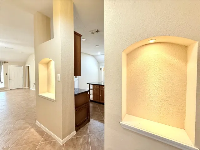 a view of a hallway with interior of the house