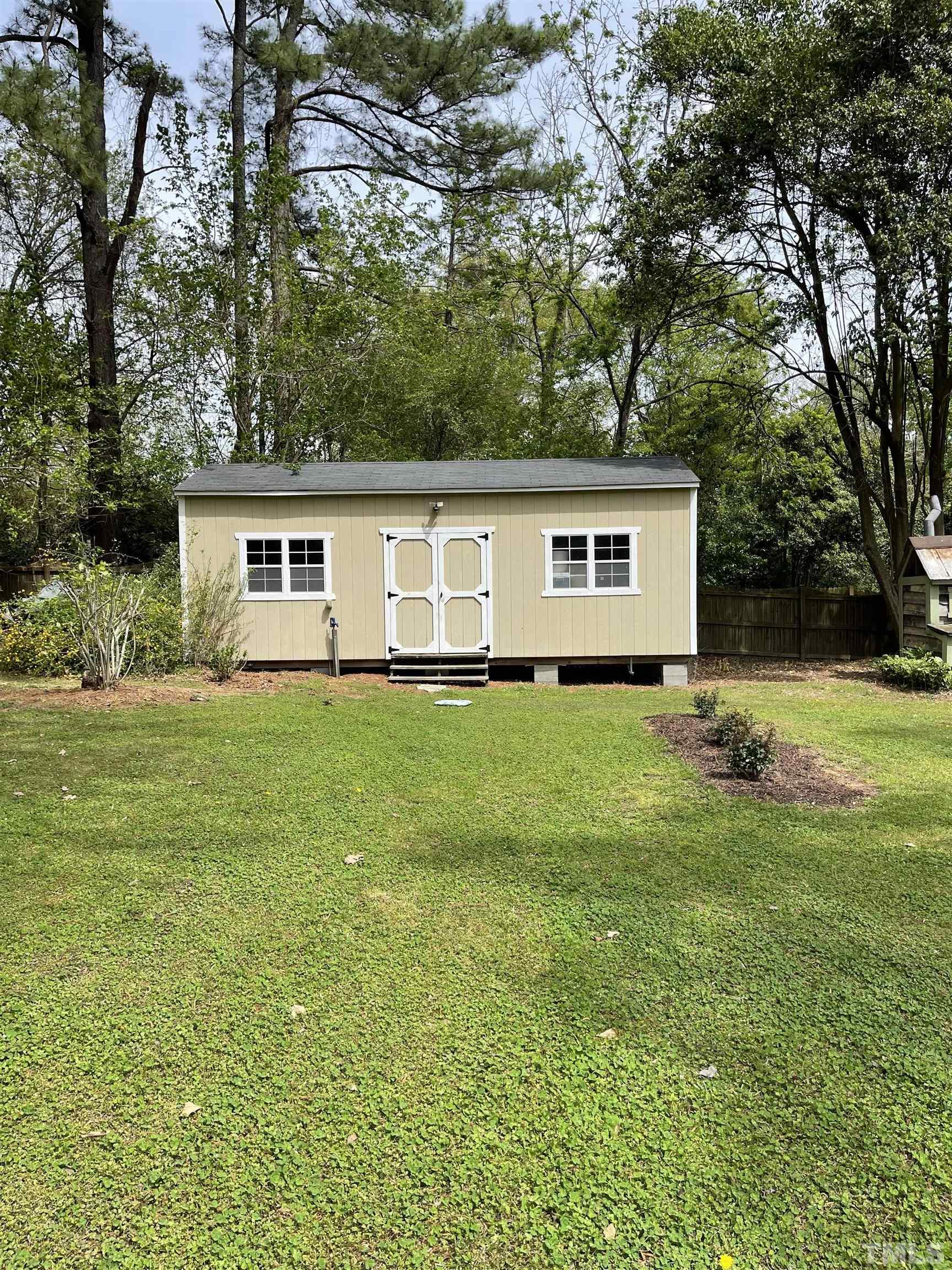 3213 Broyhill Circle Raleigh, NC 27604 - Photo 10 of 15 a front view of house with yard and green space