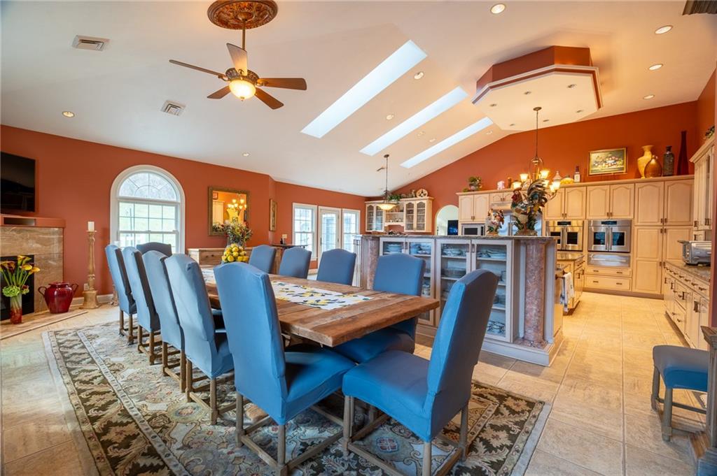 104 Angerer Road Canonsburg, PA 15317 - Photo 18 of 50 a dining room with furniture a rug and potted plants