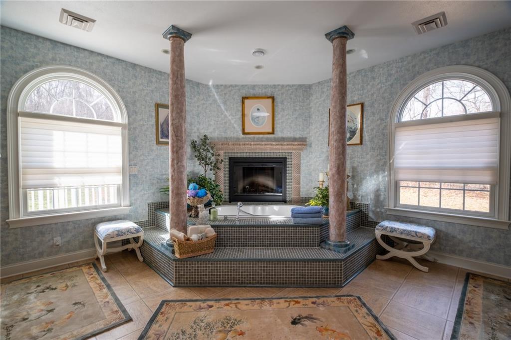 104 Angerer Road Canonsburg, PA 15317 - Photo 27 of 50 a living room with furniture a fireplace and a large window
