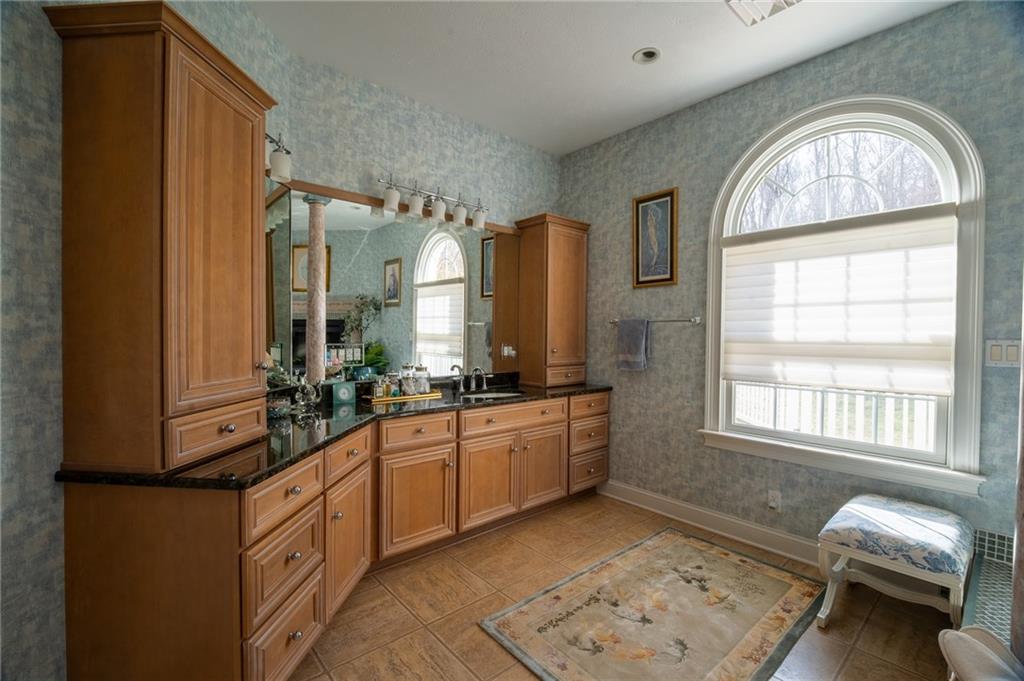 104 Angerer Road Canonsburg, PA 15317 - Photo 29 of 50 a large bathroom with a window and a mirror