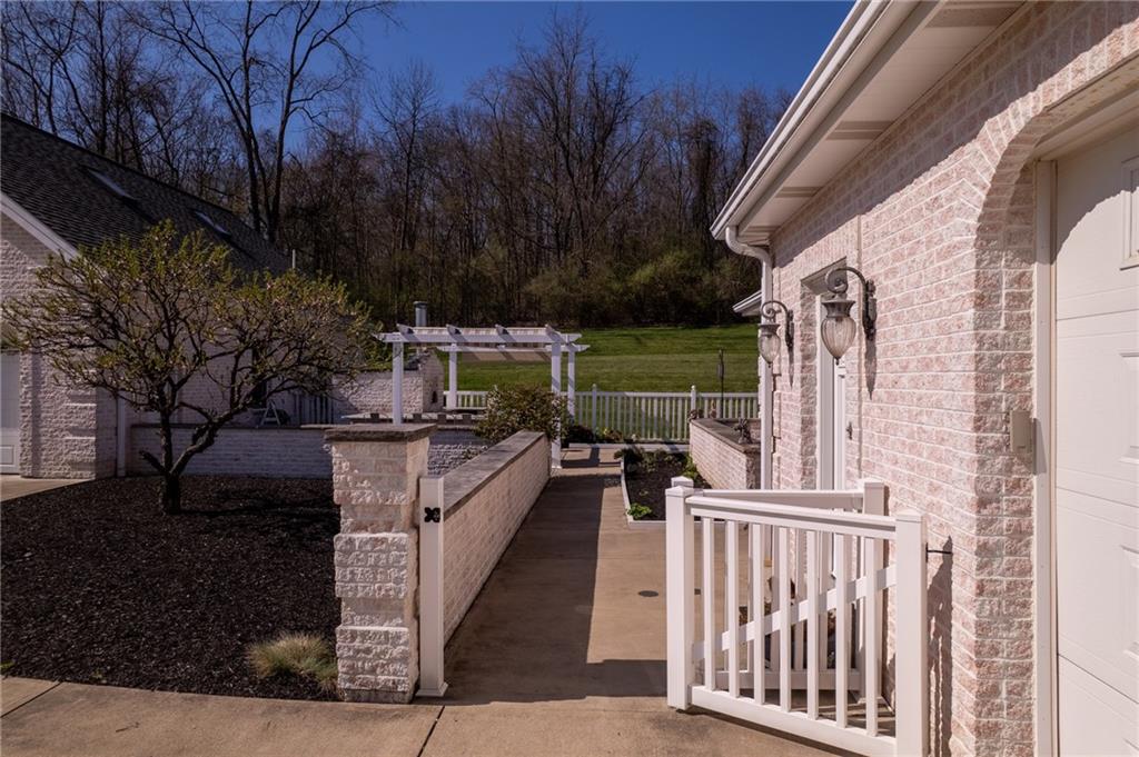 104 Angerer Road Canonsburg, PA 15317 - Photo 50 of 50 a view of a patio with table and chairs with wooden floor and fence