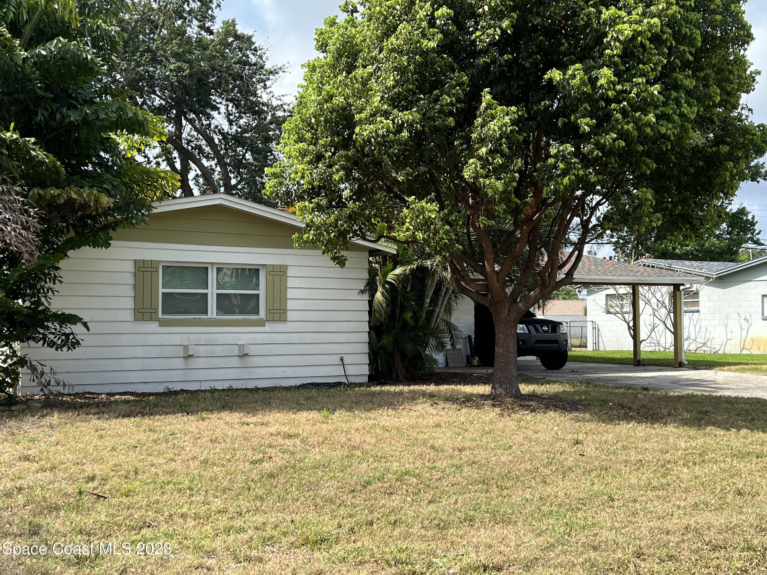 987 Kings Post Road Rockledge, FL 32955 - Photo 3 of 22 IMG-4398