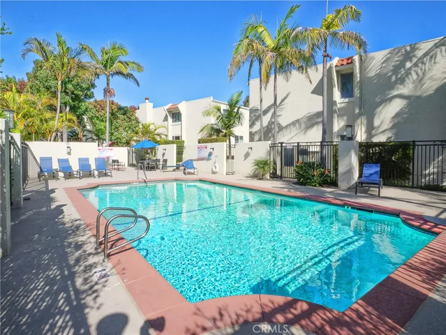 a view of a swimming pool with a patio