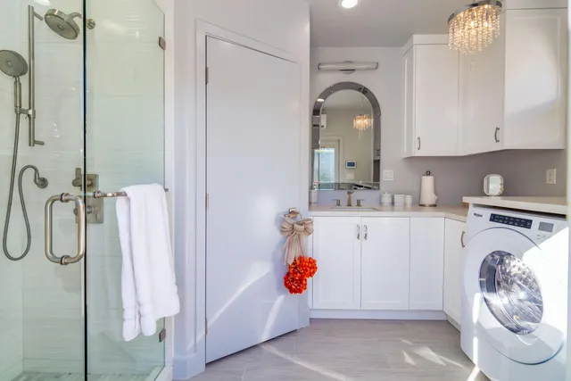 a utility room with cabinets