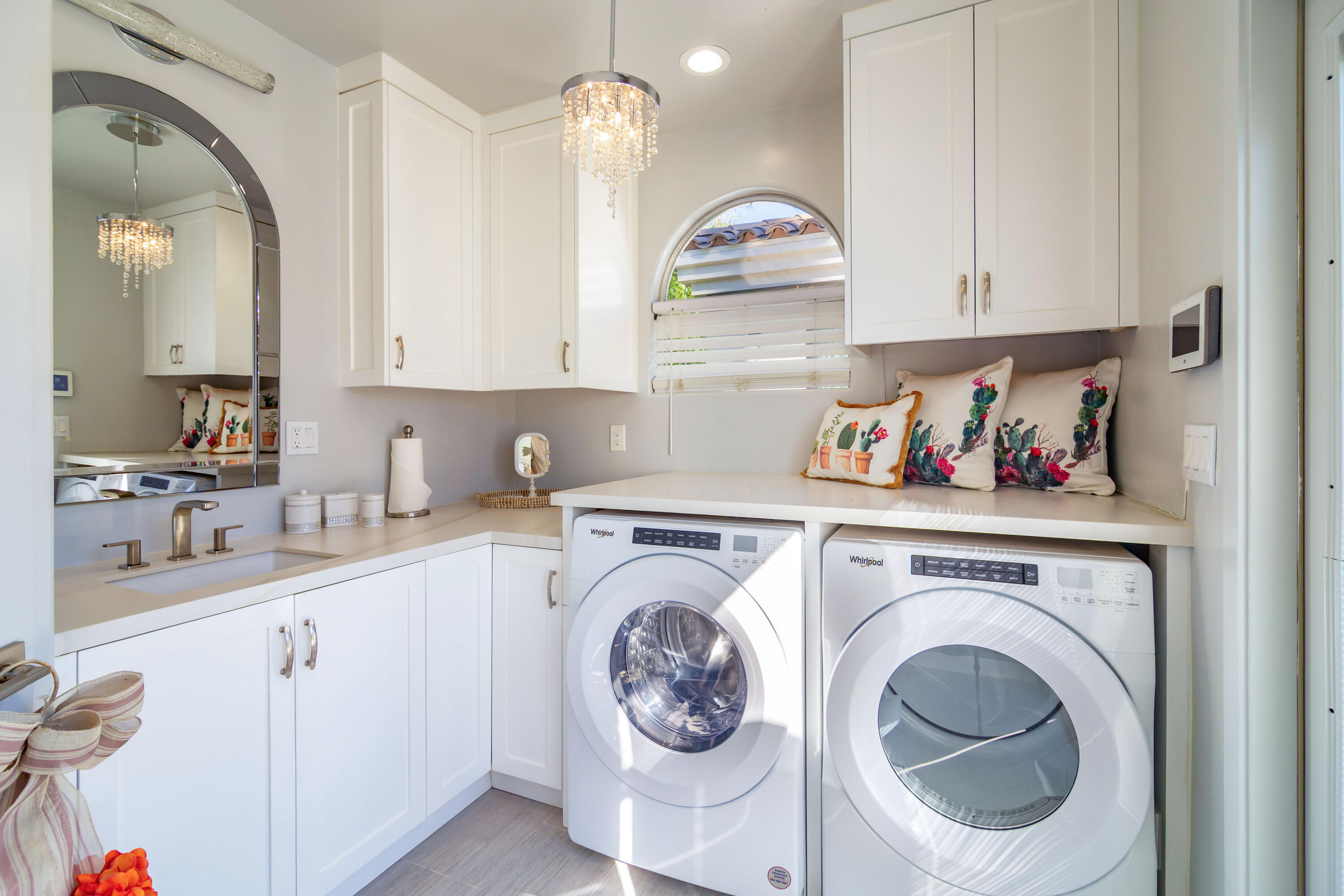 80501 Ave 48, Unit 30 Indio, CA 92201 - Photo 12 of 26 a kitchen with white cabinets and sink