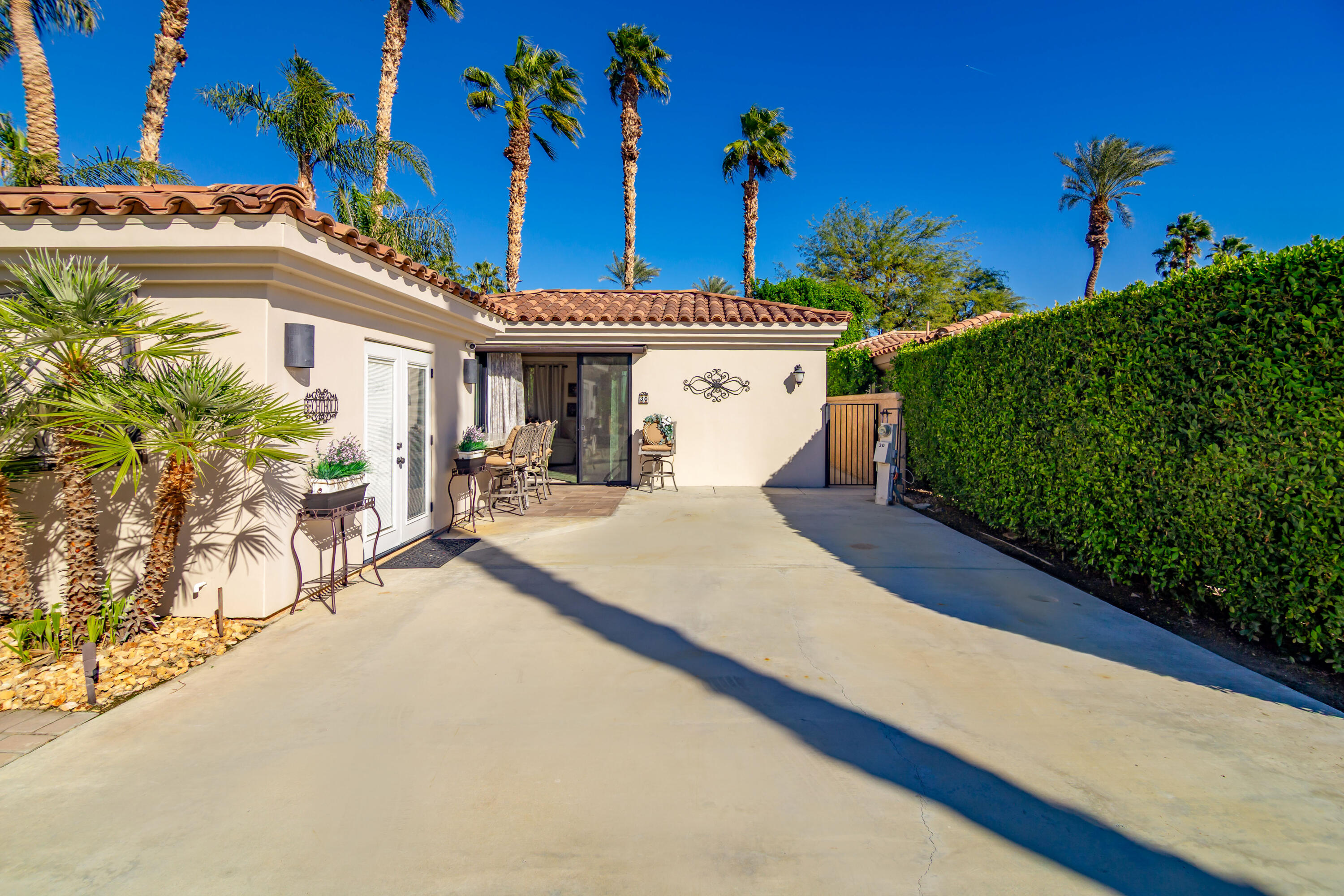 80501 Ave 48, Unit 30 Indio, CA 92201 - Photo 3 of 26 a view of a house with a patio
