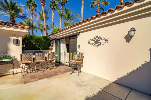 a building outdoor space with patio furniture