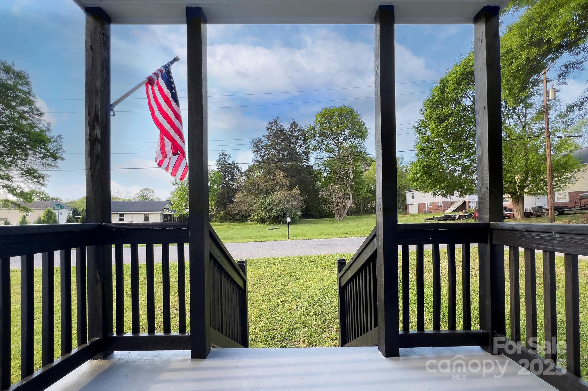 103 Moore Avenue Mount Holly, NC 28120 - Photo 2 of 21 a view of a balcony with yard
