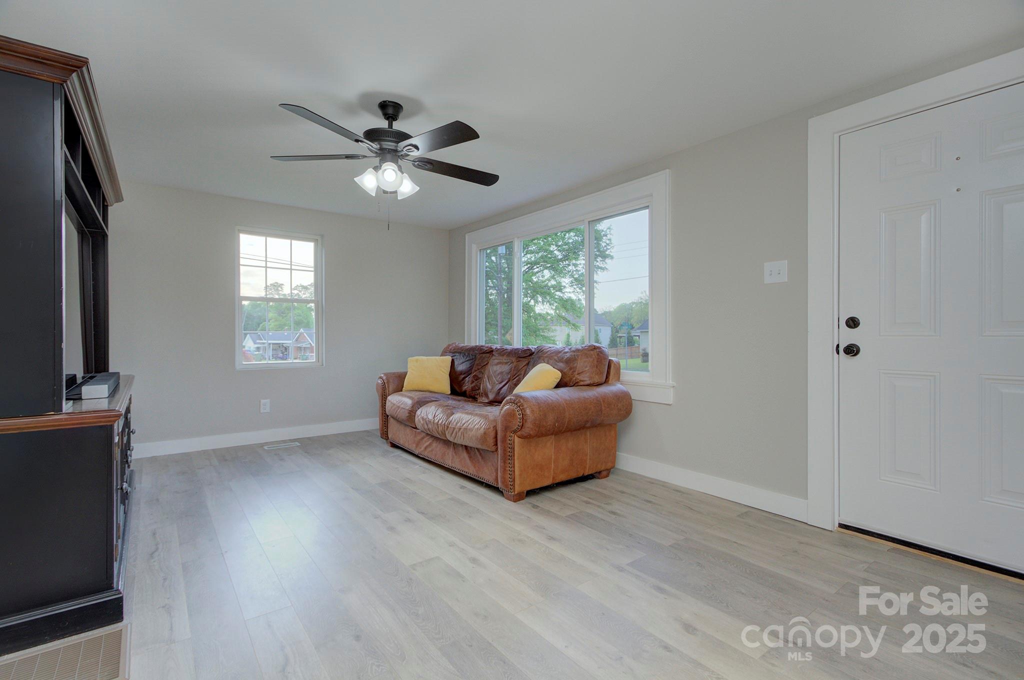 103 Moore Avenue Mount Holly, NC 28120 - Photo 3 of 21 a living room with furniture and a window